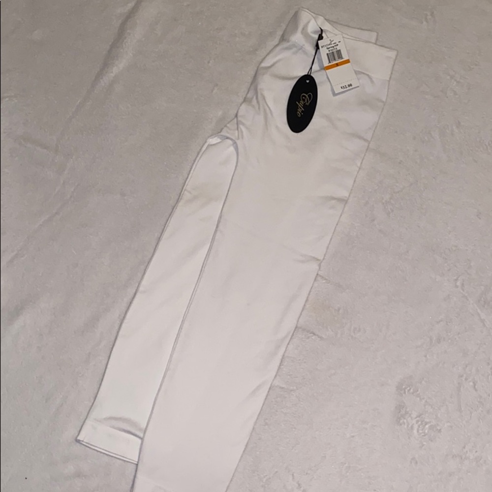 Small white pair of leggings